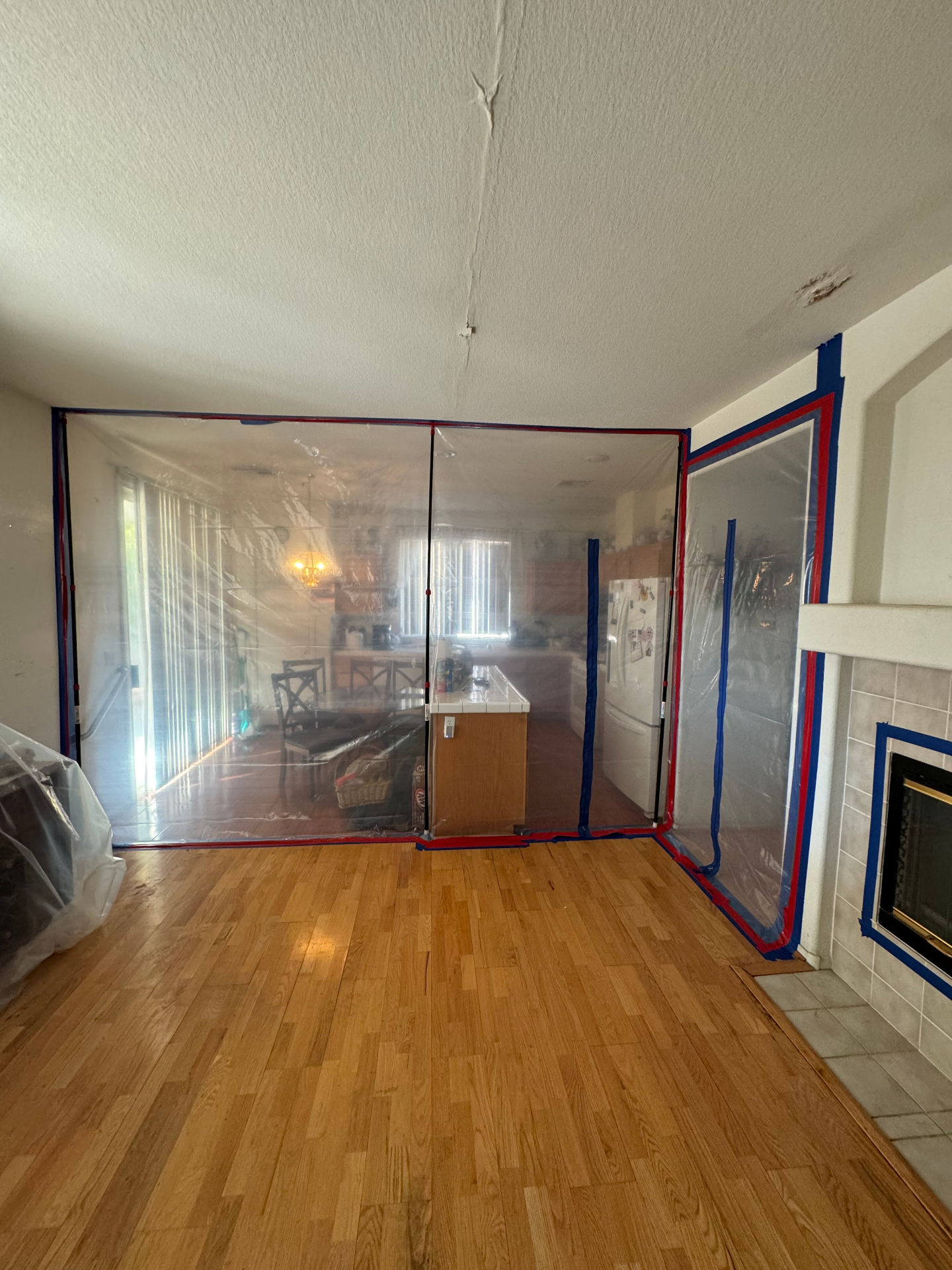 Negative-air HEPA mold containment barrier in a Ozark commercial space